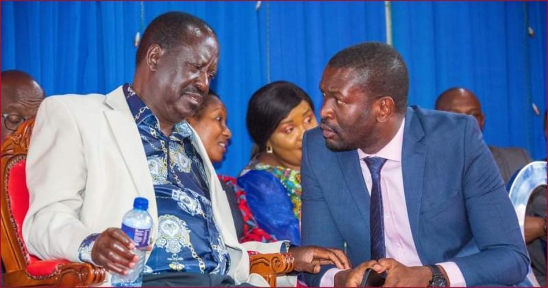 ODM leader Raila Odinga sharing a moment with secretary general Edwin Sifuna.